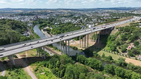 Aerial view of German highway A3 and highway-bridge Stock Footage 340328853