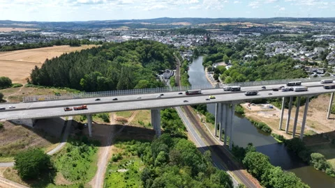 Aerial view of German highway A3 and highway-bridge Stock Footage 340328907