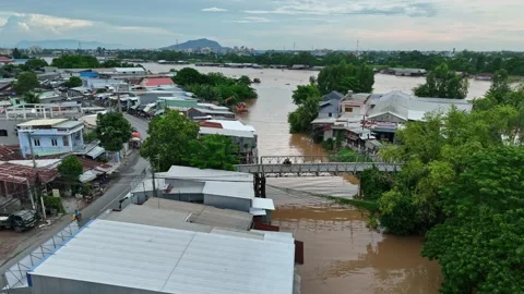 Aerial view of An Giang town surrounded by floodwater during Vietnam's Mekong De Stock Footage 342957762