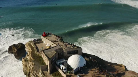 Aerial view of giant waves of Atlantic ocean in Nazare, Portugal Stock Footage 167516453