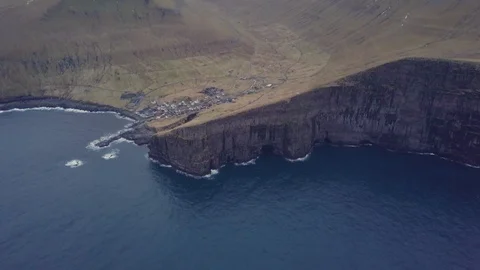 Aerial view from Gjogv between cliffs and mountains, Faroe Islands, Denmark Stock Footage 116211071
