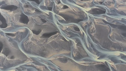 Aerial view of glacial river patterns in Iceland. Stock Footage 340282409