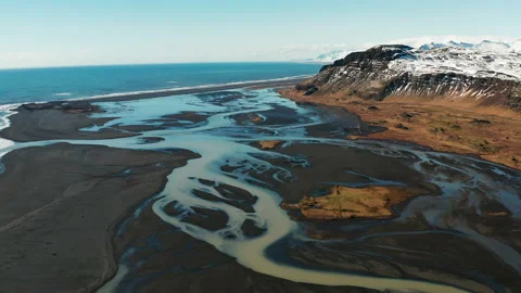 Aerial view of a glacial river system in the south of Iceland. Video stock 133864074