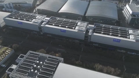 Aerial view of Global Technical Realty data centers featuring dense Stock Footage 297352381