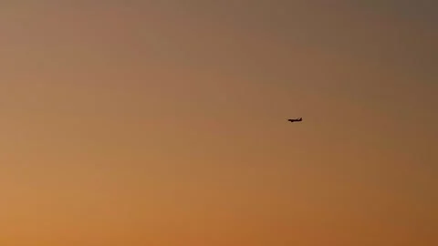 Aerial view of glowing sunset over tropical islands and sea 스톡 동영상 332975528