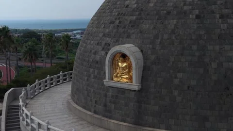 Aerial view of golden Buddha at Tabsa Temple, South Korea. Stock Footage 345080587