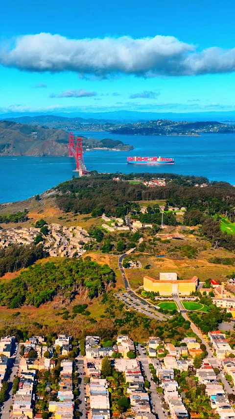 Aerial view of Golden Gate Bridge and cargo ship, San Francisco, California Stock Footage 342274745