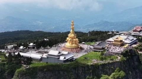 Aerial view of Golden Summit, Mount Emei with Buddha statue and temples, Sichuan 스톡 동영상 336757706