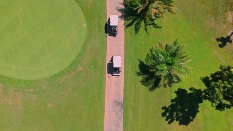 Aerial View of Golf Carts on Course - 4K Video Video stock 339506078