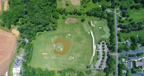 An aerial view of a golf complex in suburban Maryland Stock Footage 132917455