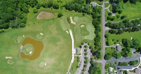 An aerial view of a golf complex in suburban Maryland Stock Footage 132920185