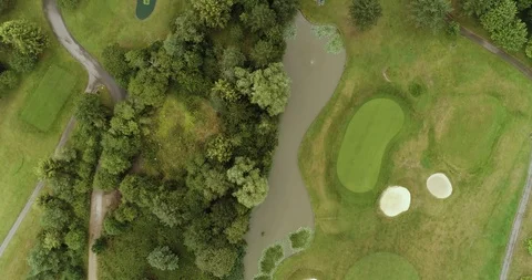 Aerial view of golf course and country club with ponds and lakes drone aerial 4k Stock Footage 124647384