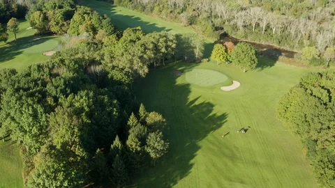 Aerial view of Golf Course. Drone flying over pond, trees, golf course 動画素材 116797433