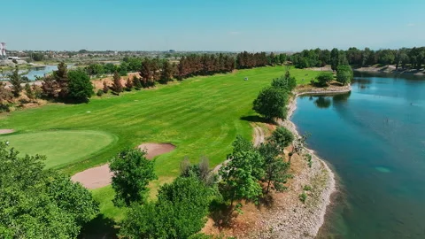 Aerial view of golf course. Drone flying over golf club in summer Stock Footage 246750370