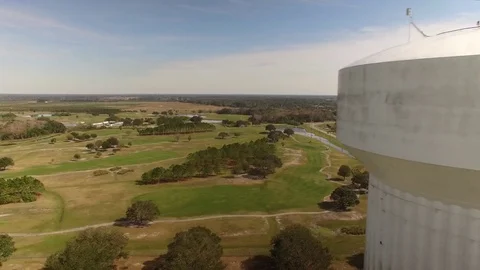 Aerial View of Golf Course, Fly by Water Tower, 4K Stock Footage 72606241