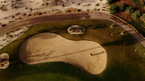 Aerial View Of Golf Course. Man Hits Ball. Stock Footage 240496378