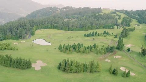 Aerial View of the Golf Course in Mountains Stock Footage 72193311
