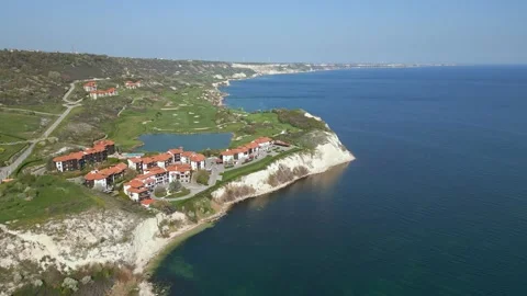 Aerial View of Golf Course by the Ocean Stock Footage 272143399