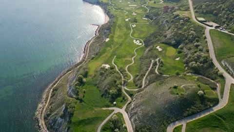 Aerial View of Golf Course by the Ocean Stock Footage 272145449