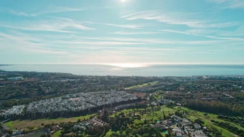 Aerial view of the golf courses and the sea Marbella Stock Footage 226991596