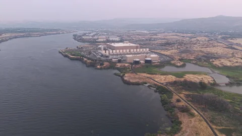 Aerial view of the Google data center in The Dalles, Oregon Stock Footage 345361030