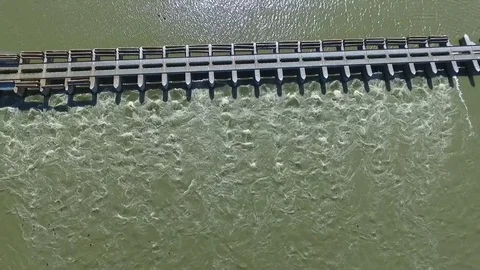 Aerial view of Goolwa Barrages between River Murray and Coorong Stock Footage 76180634