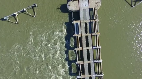 Aerial view of Goolwa Barrages between River Murray and Coorong Stock Footage 76180640