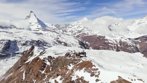 Aerial view of Gornergrat in Winter Mountain Zermatt Ski Resort, Matterhorn Alps Stock Footage 305642188