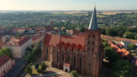 Aerial view of a Gothic Cathedral in small, old town in Poland Europe Stock Footage 115091980