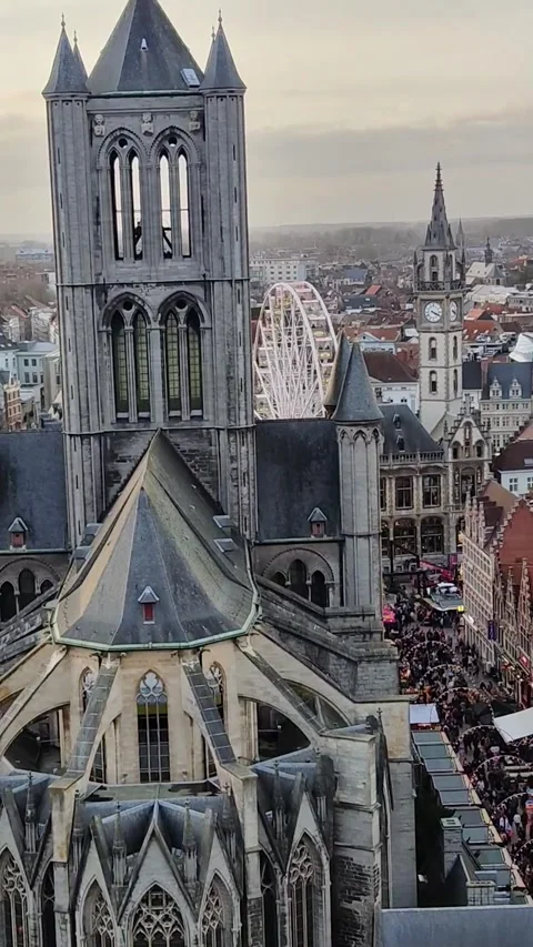 Aerial view of gothic Saint Nickolas Cathedral, Ghent cityscape from above Stock Footage 316253382