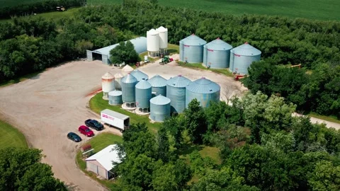 Aerial View of Grain and Fertilizer Bins at Small Rural Farm Stock Footage 342007656