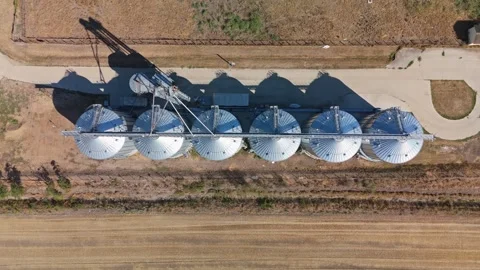 Aerial view of grain silos and feed mill in Pásztó, Hungary summer landscape Stock Footage 345995432