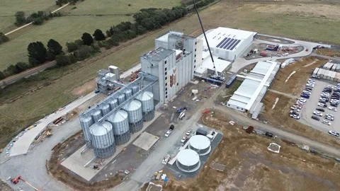 Aerial view of grain silos at facility Stock Footage 332750099