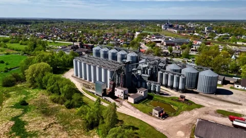 Aerial view of grain storage facility in rural Latvia. Stock Footage 341953156
