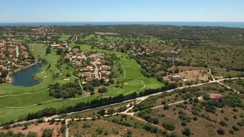 Aerial view of Gramacho and Vale da Pinta, Lagoa, Carvoeiro, Algarve, Portugal Stock Footage 153177585