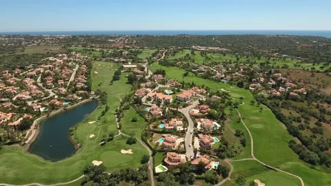 Aerial view of Gramacho and Vale da Pinta, Lagoa, Carvoeiro, Algarve, Portugal Stock Footage 153181414
