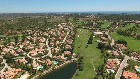 Aerial view of Gramacho and Vale da Pinta, Lagoa, Carvoeiro, Algarve, Portugal Stock Footage 153187244