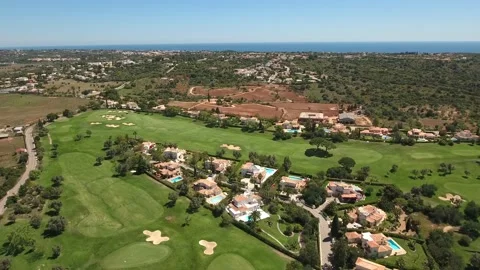 Aerial view of Gramacho and Vale da Pinta, Lagoa, Carvoeiro, Algarve, Portugal Stock Footage 153202653