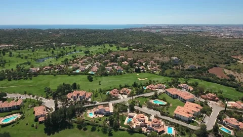 Aerial view of Gramacho and Vale da Pinta, Lagoa, Carvoeiro, Algarve, Portugal Stock Footage 153234351
