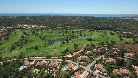 Aerial view of Gramacho and Vale da Pinta, Lagoa, Carvoeiro, Algarve, Portugal Stock Footage 153238699