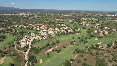 Aerial view of Gramacho and Vale da Pinta, Lagoa, Carvoeiro, Algarve, Portugal Stock Footage 153290748
