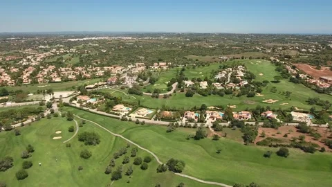 Aerial view of Gramacho and Vale da Pinta, Lagoa, Carvoeiro, Algarve, Portugal Stock Footage 153296548