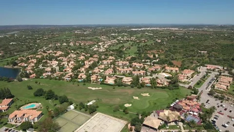 Aerial view of Gramacho and Vale da Pinta, Lagoa, Carvoeiro, Algarve, Portugal Stock Footage 153299100