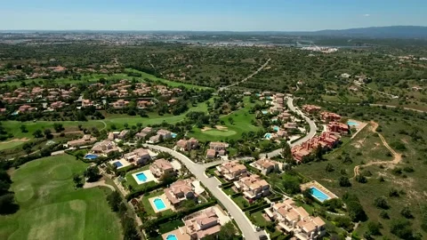 Aerial view of Gramacho and Vale da Pinta, Lagoa, Carvoeiro, Algarve, Portugal Stock Footage 153323185