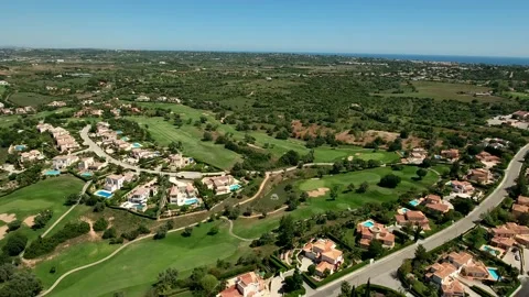 Aerial view of Gramacho and Vale da Pinta, Lagoa, Carvoeiro, Algarve, Portugal Stock Footage 153330676