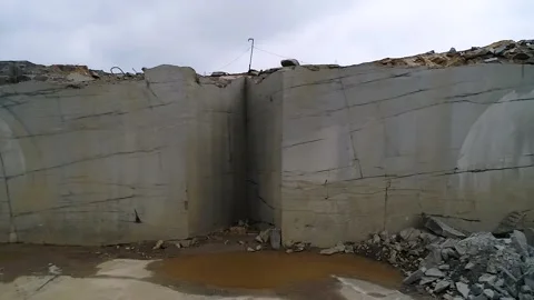 Aerial view of a granite quarry, mining of granite slabs. Stock Footage 162255407
