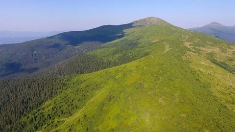 Aerial view of grass hills on a mountain ridge Stock Footage 80587255