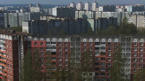 Aerial view of gray high-rise apartment buildings, dense urban residential area Stock Footage 123054053