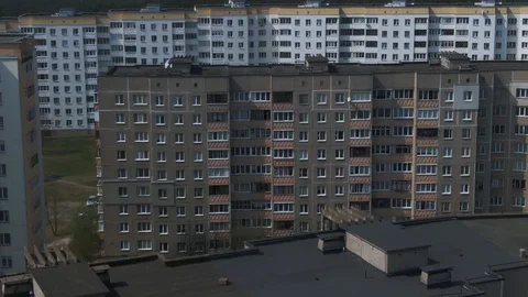 Aerial view of gray high-rise apartment buildings, dense urban residential area Stock Footage 123055853