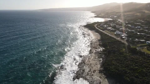 Aerial view of Great Ocean Road coastline at sunset Stock Footage 335996312